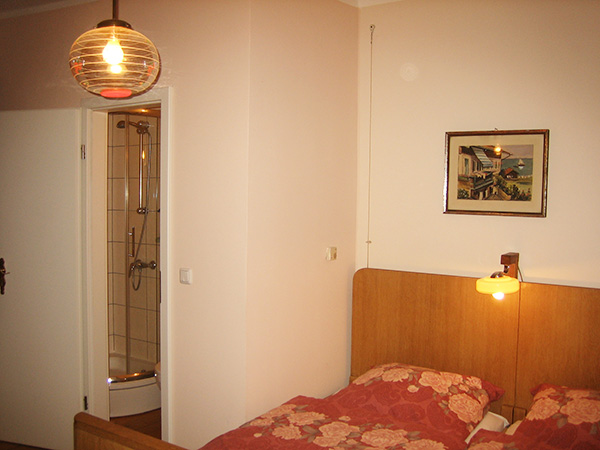Die Suite  -  Schlafzimmer mit Naßzelle